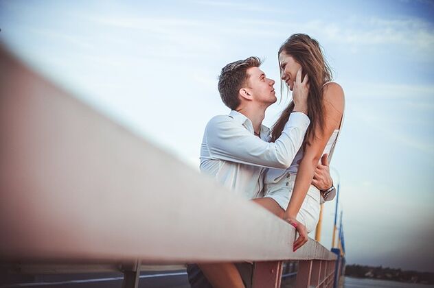 A woman in the arms of a very capable man
